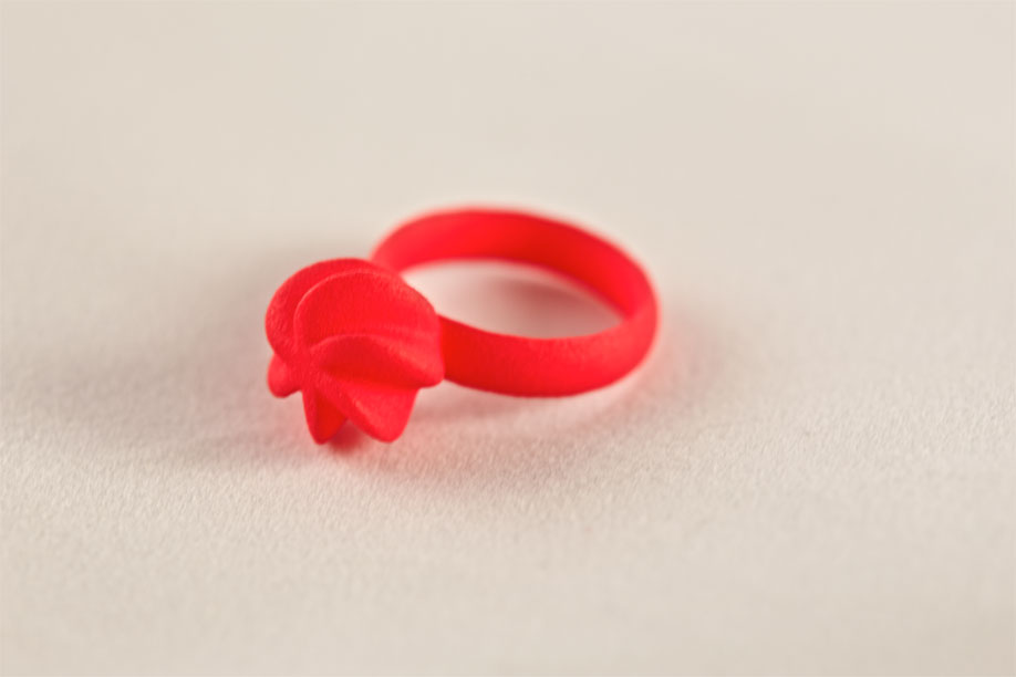 Red Flora ring on white background
